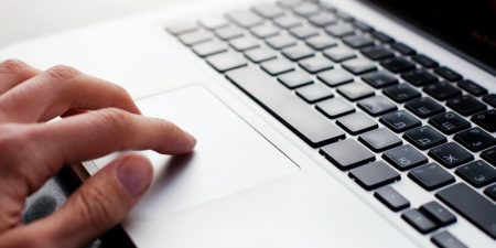 Hand with Laptop Image